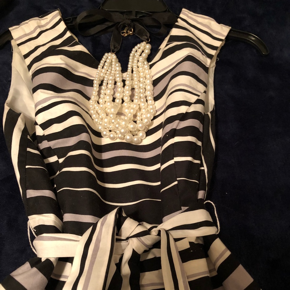 Black and white sleeveless dress.